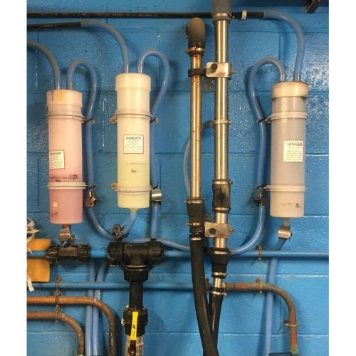 Liquid chemical dosing and dispensing system